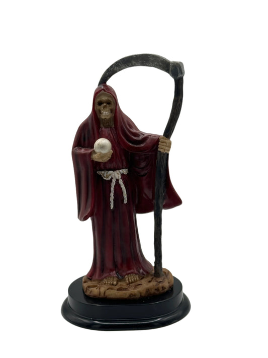 small red  santa muerte statue