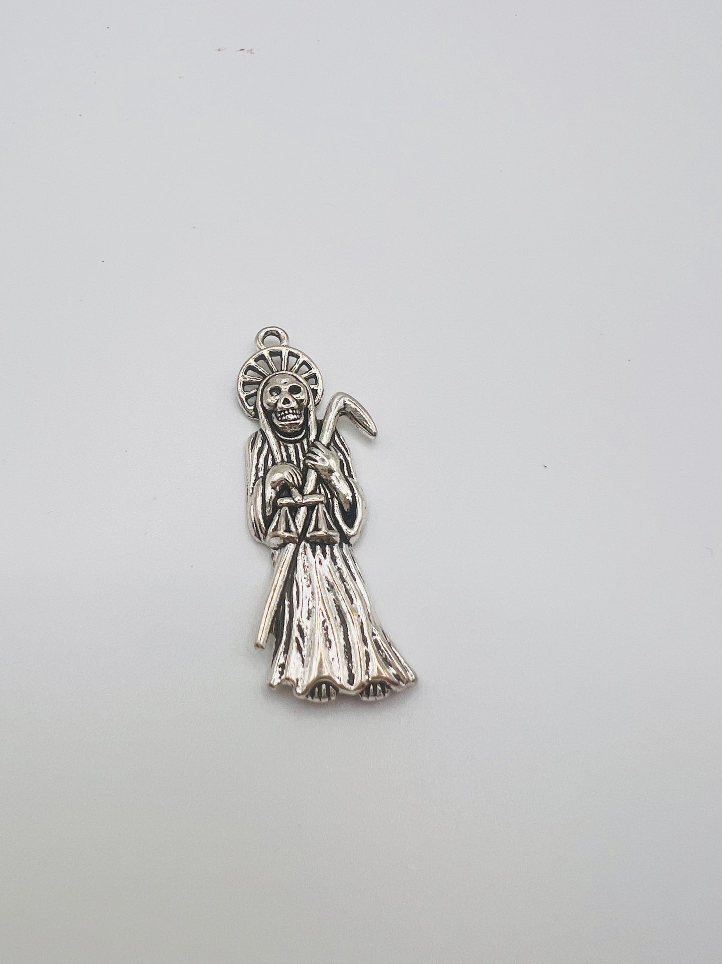 Santa Muerte pendant metal